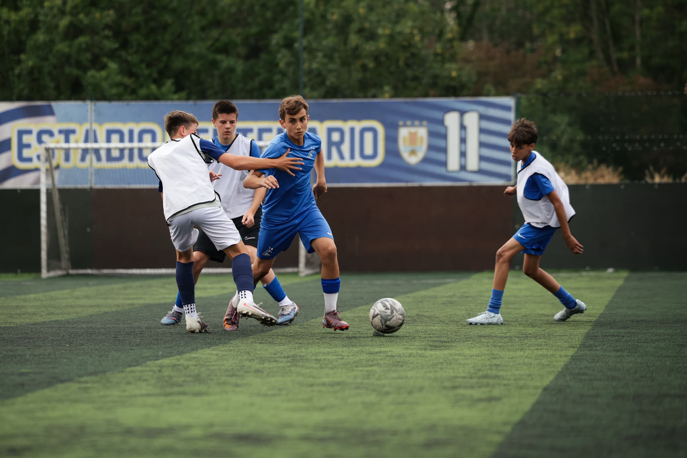 SG Elite players competing for the ball at Goals Wimbledon