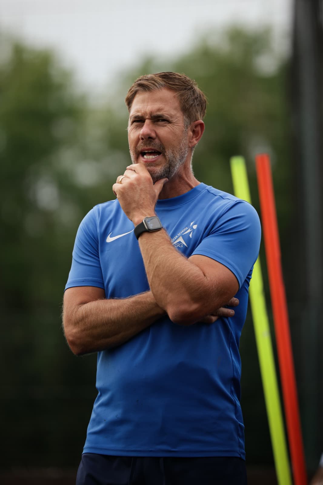 SG Sport coach watching a session