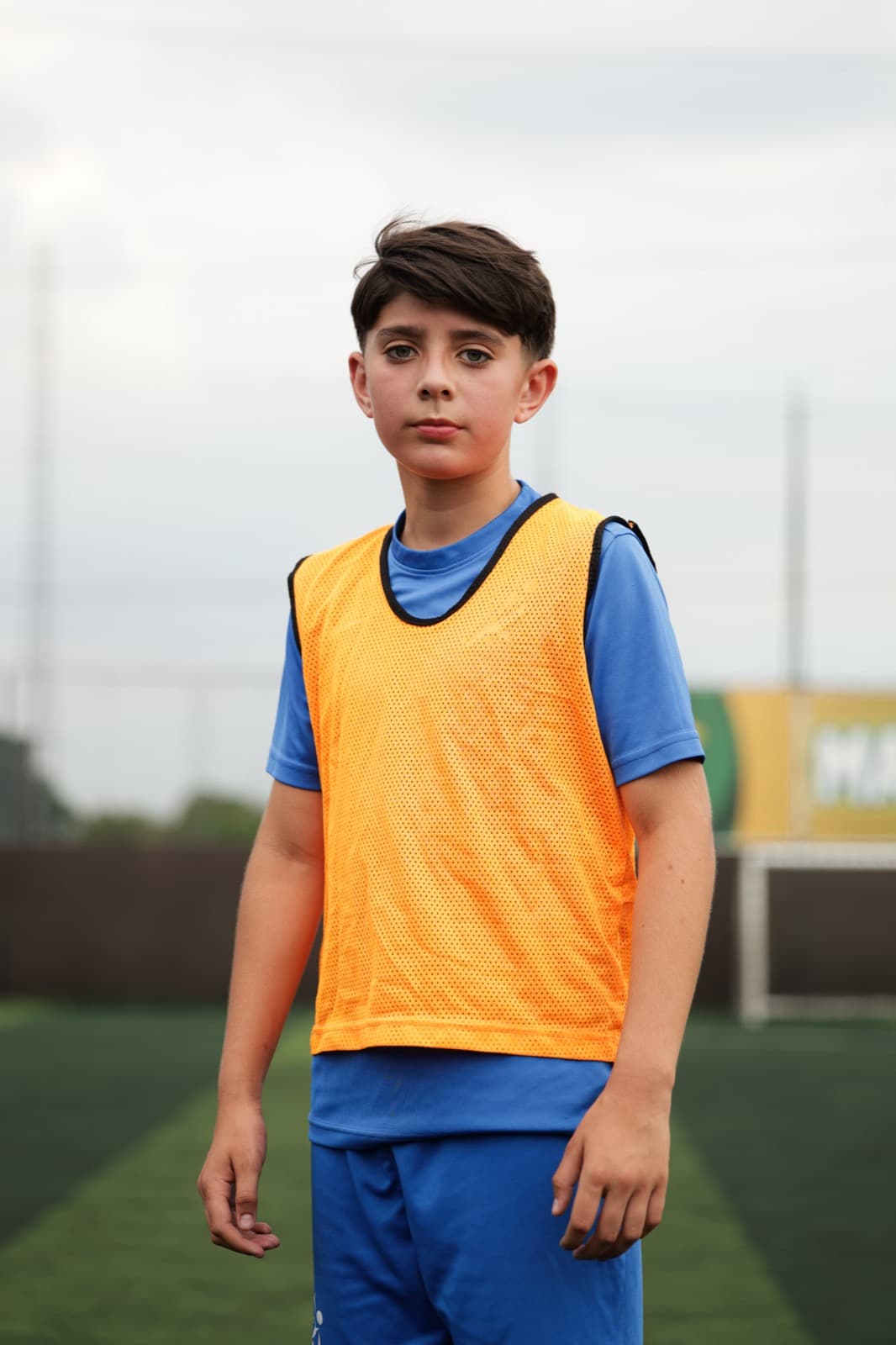 Young SG Sport player in a training bib